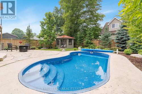 92 Nelson St, Barrie, ON - Outdoor With In Ground Pool With Backyard