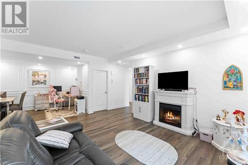 35 Overberg Way Unit#A, Ottawa, ON - Indoor Photo Showing Living Room With Fireplace