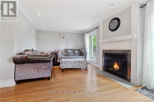 1894 La Chapelle Street, Ottawa, ON - Indoor Photo Showing Living Room With Fireplace