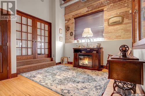 204 1170 Broad Street, Regina, SK - Indoor With Fireplace