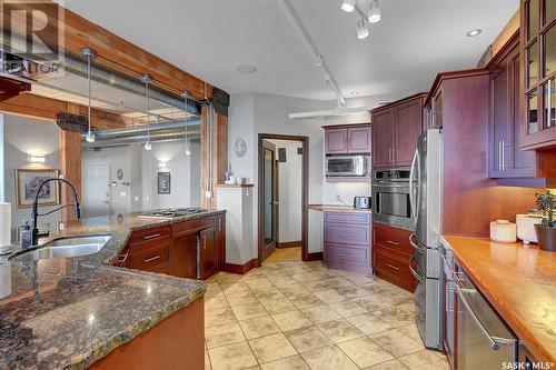 204 1170 Broad Street, Regina, SK - Indoor Photo Showing Kitchen With Double Sink