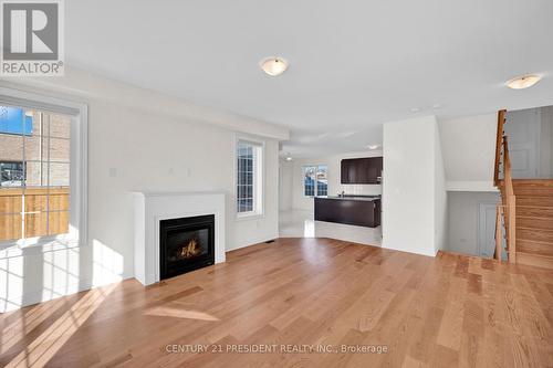 2577 Bandsman Crescent, Oshawa, ON - Indoor Photo Showing Living Room With Fireplace