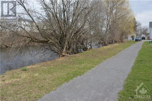 Walking path w/ river to left - 45 Carleton Street, Almonte, ON - Outdoor With View
