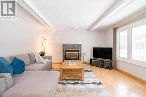 13 Cherrywood Lane, Innisfil, ON - Indoor Photo Showing Living Room With Fireplace