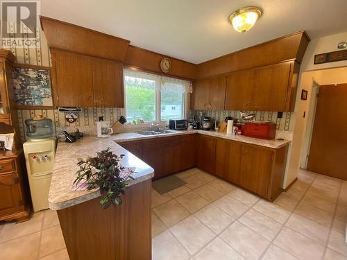 16357 2 Highway, Dawson Creek, BC - Indoor Photo Showing Kitchen With Double Sink