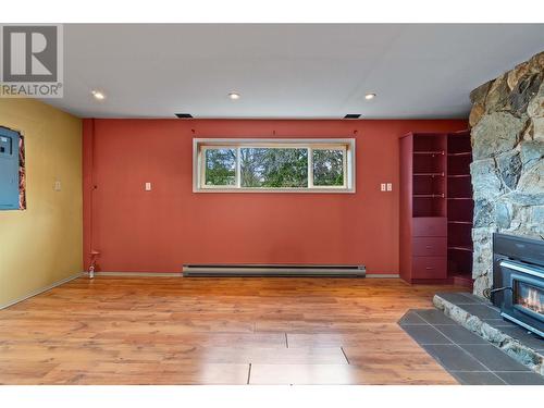 3550 16 Avenue Ne, Salmon Arm, BC - Indoor Photo Showing Other Room With Fireplace