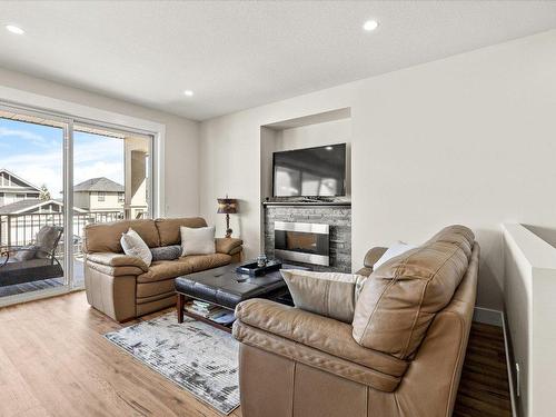 1274 Bergamot Avenue, Kelowna, BC - Indoor Photo Showing Living Room With Fireplace