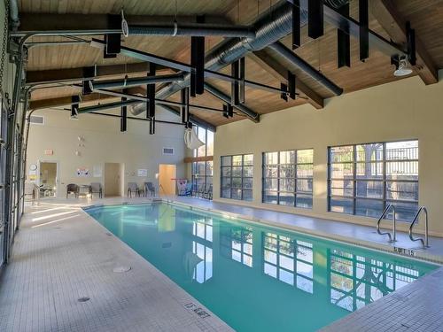 202-600 Sarsons Road, Kelowna, BC - Indoor Photo Showing Other Room With In Ground Pool