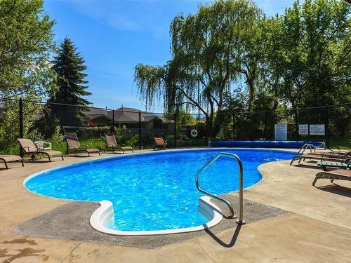 303-3175 De Montreuil Court, Kelowna, BC - Outdoor With In Ground Pool With Backyard