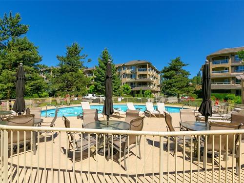 303-1960 Enterprise Way, Kelowna, BC - Outdoor With In Ground Pool