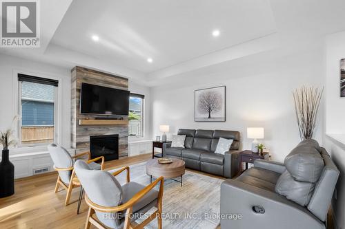 218 Boardwalk Way, Thames Centre, ON - Indoor Photo Showing Living Room With Fireplace