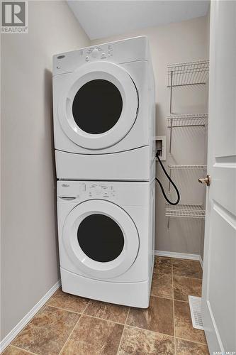 409 100 Chaparral Boulevard, Martensville, SK - Indoor Photo Showing Laundry Room
