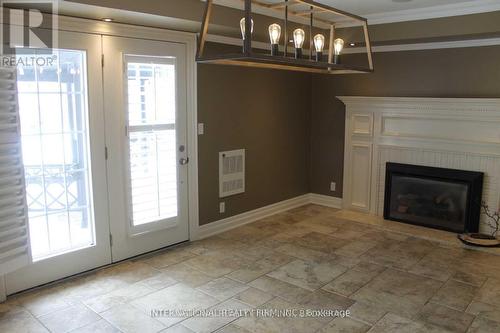 7901 Cochrane Street, Whitby, ON - Indoor With Fireplace