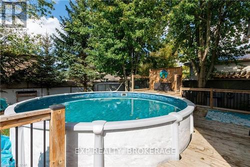 27 Robin St, North Middlesex, ON - Outdoor With Above Ground Pool With Backyard