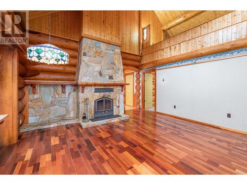 2197 3 Highway, Creston, BC - Indoor Photo Showing Living Room With Fireplace