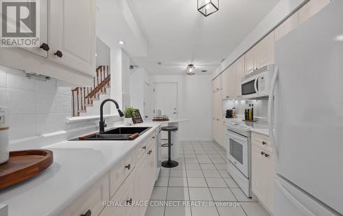 #423 -1400 The Esplanade  N, Pickering, ON - Indoor Photo Showing Kitchen With Double Sink