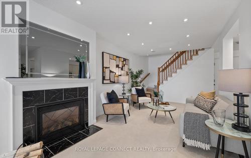 #423 -1400 The Esplanade  N, Pickering, ON - Indoor Photo Showing Living Room With Fireplace