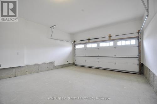 13 Dore Drive, Brantford, ON - Indoor Photo Showing Garage