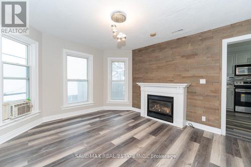 4718 Jepson St S, Niagara Falls, ON - Indoor Photo Showing Living Room With Fireplace