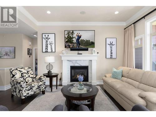 100 Falcon Point Way, Vernon, BC - Indoor Photo Showing Living Room With Fireplace