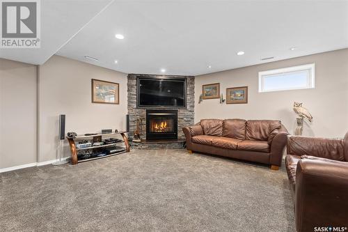 23 Dawn Road, Moose Jaw Rm No. 161, SK - Indoor Photo Showing Basement With Fireplace