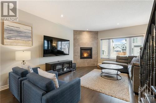 664 Bruxelles Street, Embrun, ON - Indoor Photo Showing Living Room With Fireplace