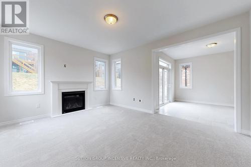 2964 Monarch Dr, Orillia, ON - Indoor Photo Showing Living Room With Fireplace