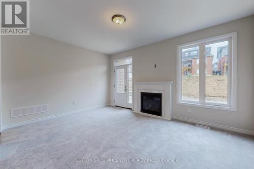 2962 Monarch Dr, Orillia, ON - Indoor Photo Showing Living Room With Fireplace