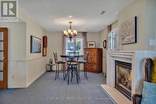 1223 Harrington Dr, Smith-Ennismore-Lakefield, ON - Indoor Photo Showing Dining Room With Fireplace