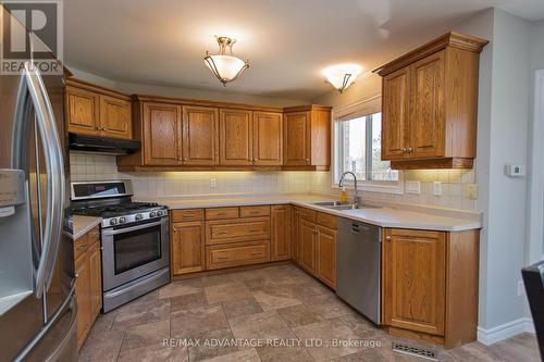 59 Winona Rd, Middlesex Centre, ON - Indoor Photo Showing Kitchen With Double Sink