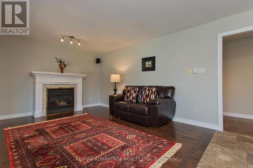59 Winona Road, Middlesex Centre, ON - Indoor Photo Showing Living Room With Fireplace