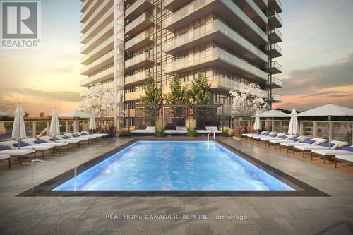 601 - 4675 Metcalfe Avenue, Mississauga, ON - Outdoor With In Ground Pool