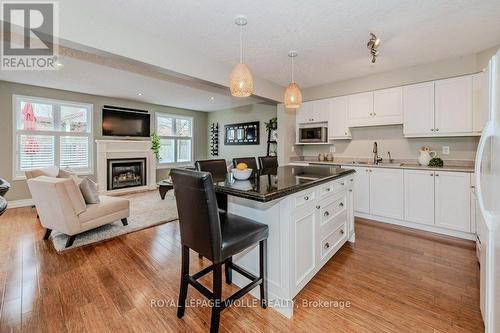 227 Dearborn Blvd, Waterloo, ON - Indoor Photo Showing Kitchen With Fireplace