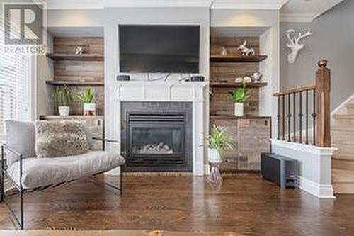 37 Leaves Terr, Toronto, ON - Indoor Photo Showing Living Room With Fireplace
