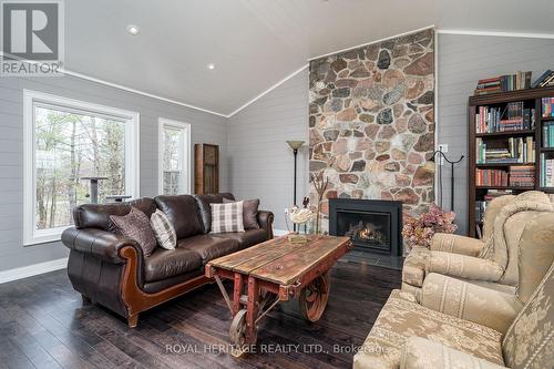 699 Cooper Road, Madoc, ON - Indoor Photo Showing Living Room With Fireplace