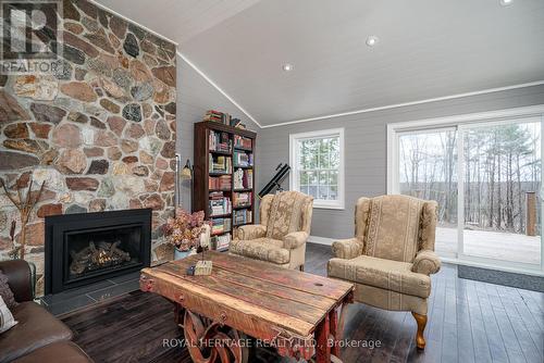 699 Cooper Rd, Madoc, ON - Indoor Photo Showing Living Room With Fireplace