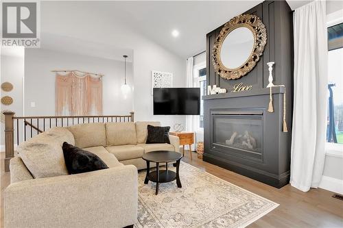 48 Dale Street, Ingleside, ON - Indoor Photo Showing Living Room With Fireplace