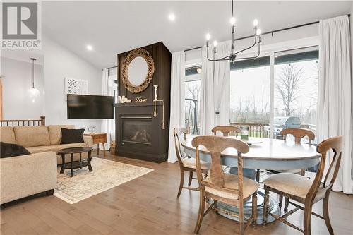 48 Dale Street, Ingleside, ON - Indoor Photo Showing Dining Room With Fireplace