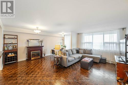 #1106 -15 La Rose Ave, Toronto, ON - Indoor Photo Showing Living Room With Fireplace