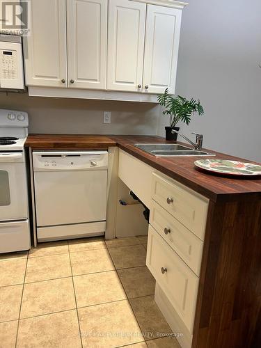 #104 -6928 Ailanthus Ave, Niagara Falls, ON - Indoor Photo Showing Kitchen With Double Sink