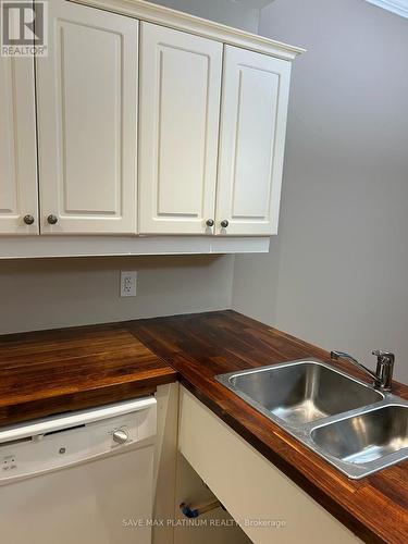 #104 -6928 Ailanthus Ave, Niagara Falls, ON - Indoor Photo Showing Kitchen With Double Sink