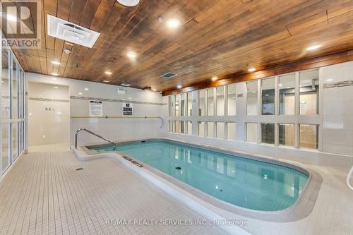 #109 -1001 Cedarglen Gate, Mississauga, ON - Indoor Photo Showing Other Room With In Ground Pool