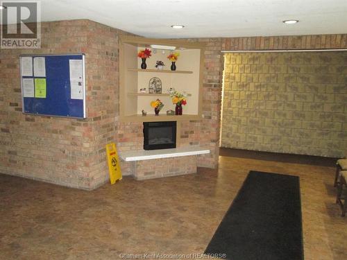 140 Park Avenue East Unit# 211, Chatham, ON - Indoor Photo Showing Other Room With Fireplace