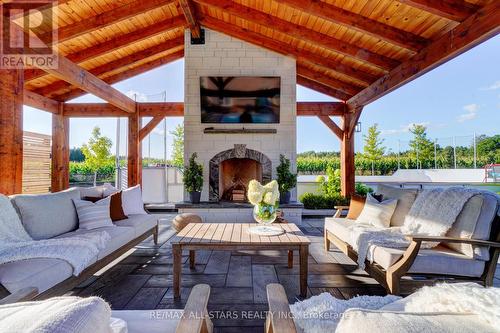 #113 -28 Wyndance Way, Uxbridge, ON - Outdoor With Fireplace With Exterior