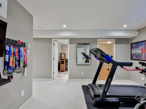 Family room - 44 Rue D'Amqui, Blainville, QC - Indoor Photo Showing Gym Room