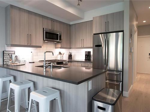 402-595 Pandora Ave, Victoria, BC - Indoor Photo Showing Kitchen With Upgraded Kitchen