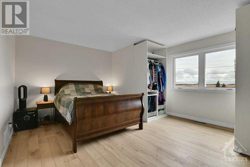 Primary bedroom with PAX wardrobe. - 124 Montana Way, Ottawa, ON - Indoor Photo Showing Bedroom
