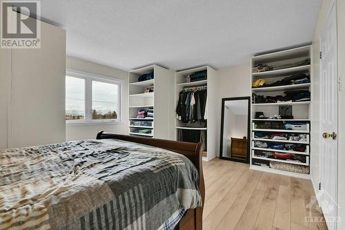 Primary bedroom with PAX wardrobe. - 124 Montana Way, Ottawa, ON - Indoor Photo Showing Bedroom