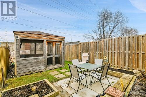 Fully fenced rear yard with raised garden beds & patio area. - 124 Montana Way, Ottawa, ON - Outdoor