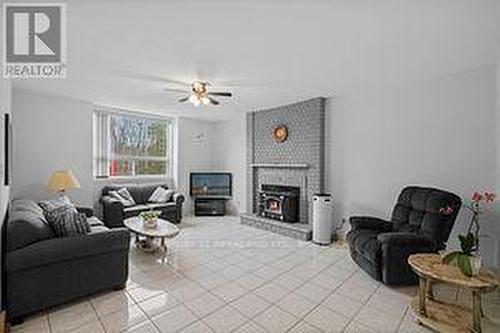 30 Bridlewood Cres, Wasaga Beach, ON - Indoor Photo Showing Living Room With Fireplace